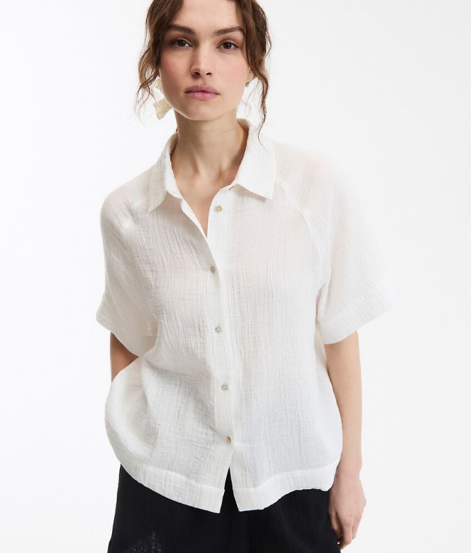 Camisa amplia